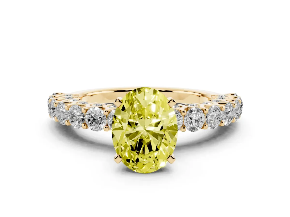 Fancy Yellow Oval Cut Diamond Solitaire Ring with Shared Prong Pavé Band and Four-Prong Setting Yellow gold