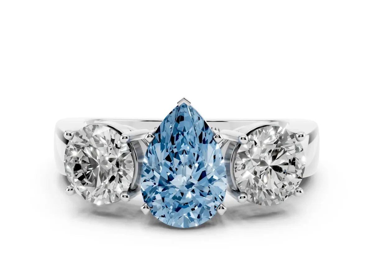 Fancy Blue Three-Stone Pear Cut Diamond Ring with Round Side Stones, Classic Band, and Four-Prong Setting White gold
