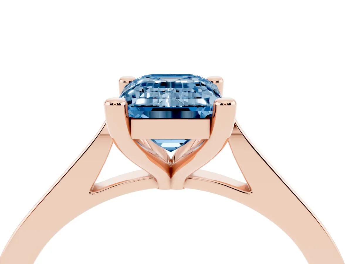 Fancy Blue Emerald Cut Solitaire Diamond Ring with Four-Prong Setting and Tapered Band Rose gold
