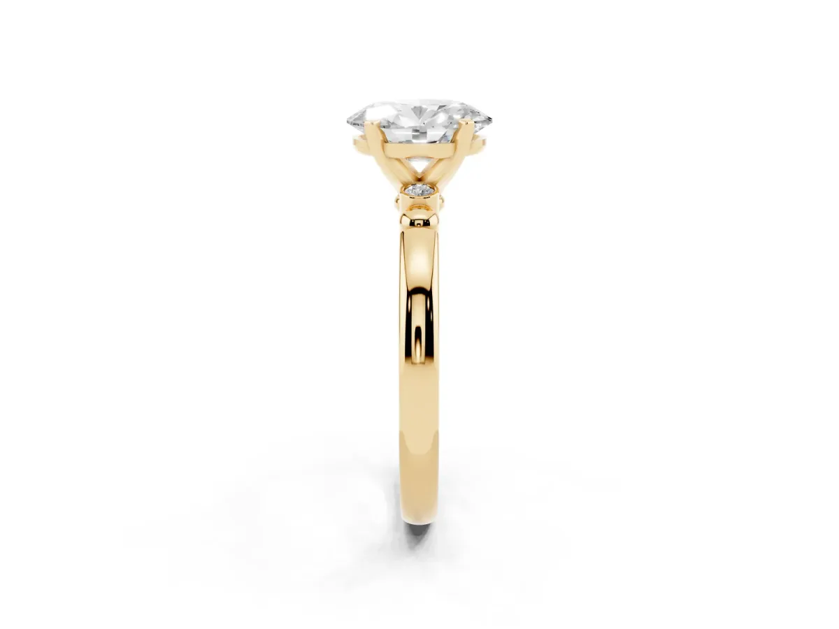 Oval Cut Solitaire Beaded Band with Four-Prong Setting Yellow gold