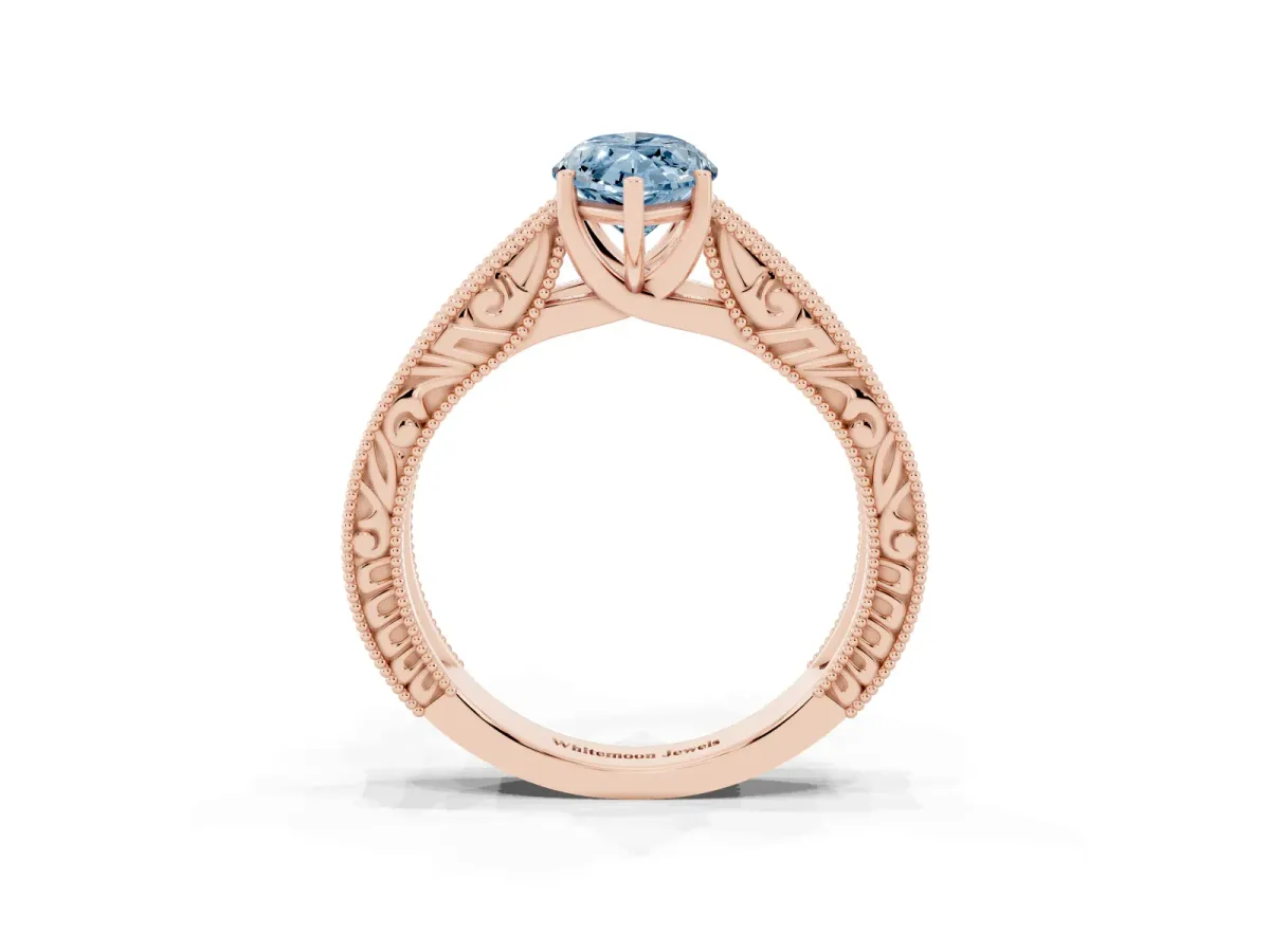 Fancy Blue Marquise Cut Diamond Solitaire Ring with Engraved Band and Four-Prong Setting Rose gold