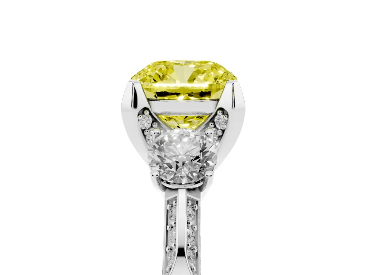 Fancy Yellow Cushion Cut Brilliant Three-Stone Diamond Ring with Pavé Band and Four-Prong Setting Platinum