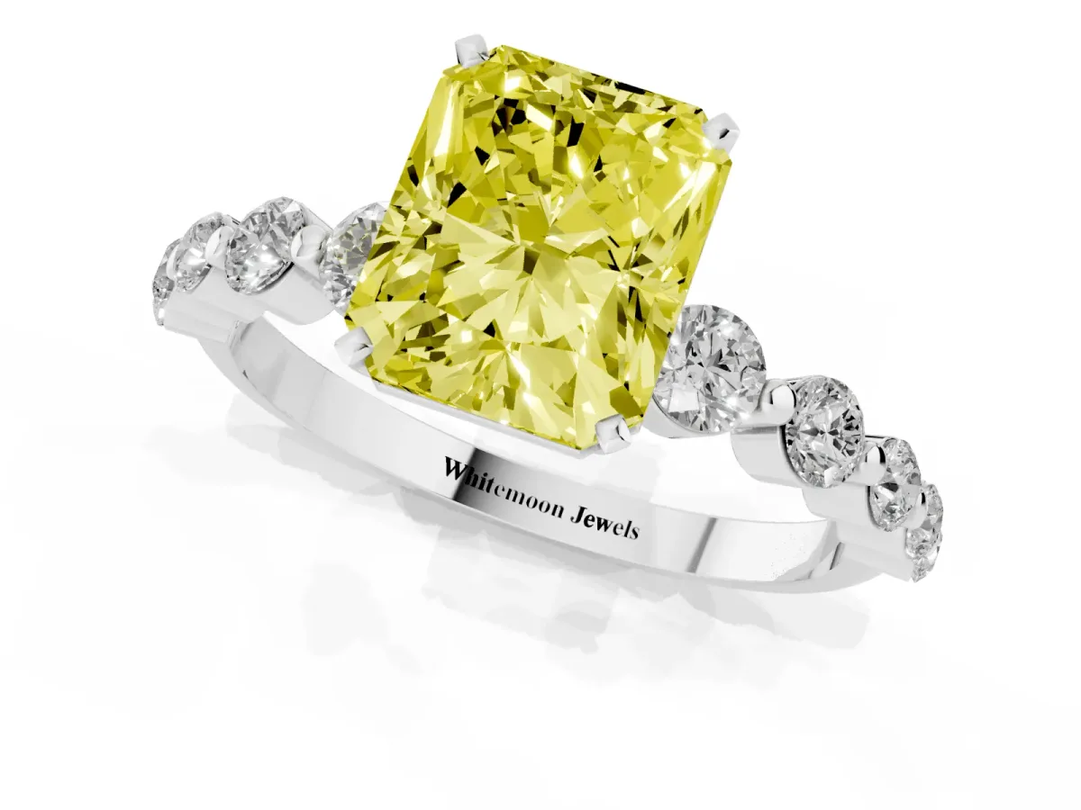 Fancy Yellow Radiant Cut Solitaire Diamond Ring with Pave Band and Four-Prong Setting Silver