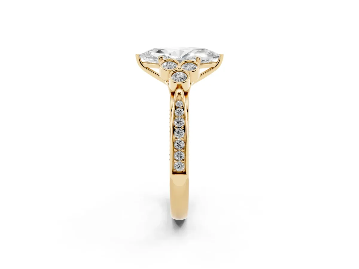 Marquise Cut Cut Diamond Engagement Ring with Bezel Set Round Side Stones and Prong Setting Yellow gold