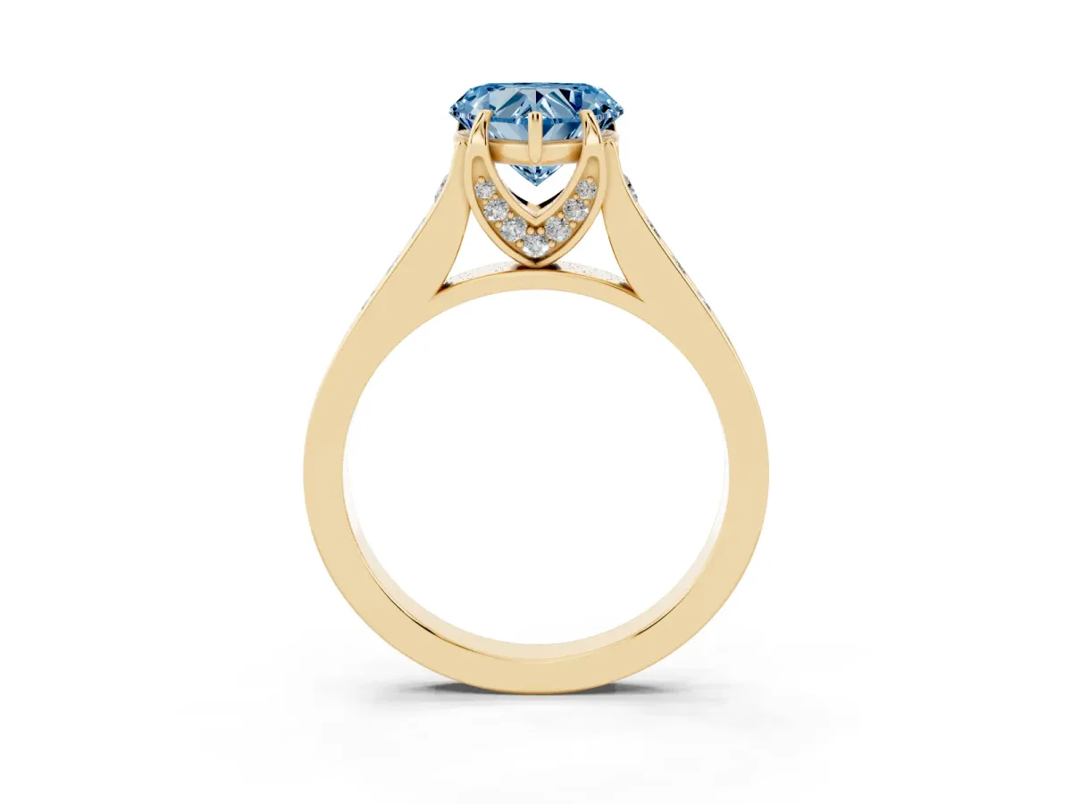 Fancy Blue Heart Cut Brilliant Cut Diamond Engagement Ring with Pavé Band and Four-Prong Setting Yellow gold