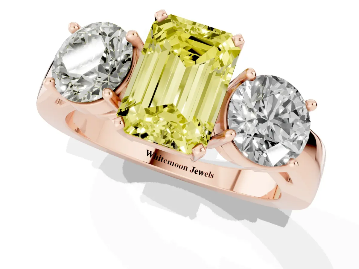 Fancy Yellow Three-Stone Emerald Cut Diamond Ring with Round Side Stones, Classic Band, and Four-Prong Setting Rose gold