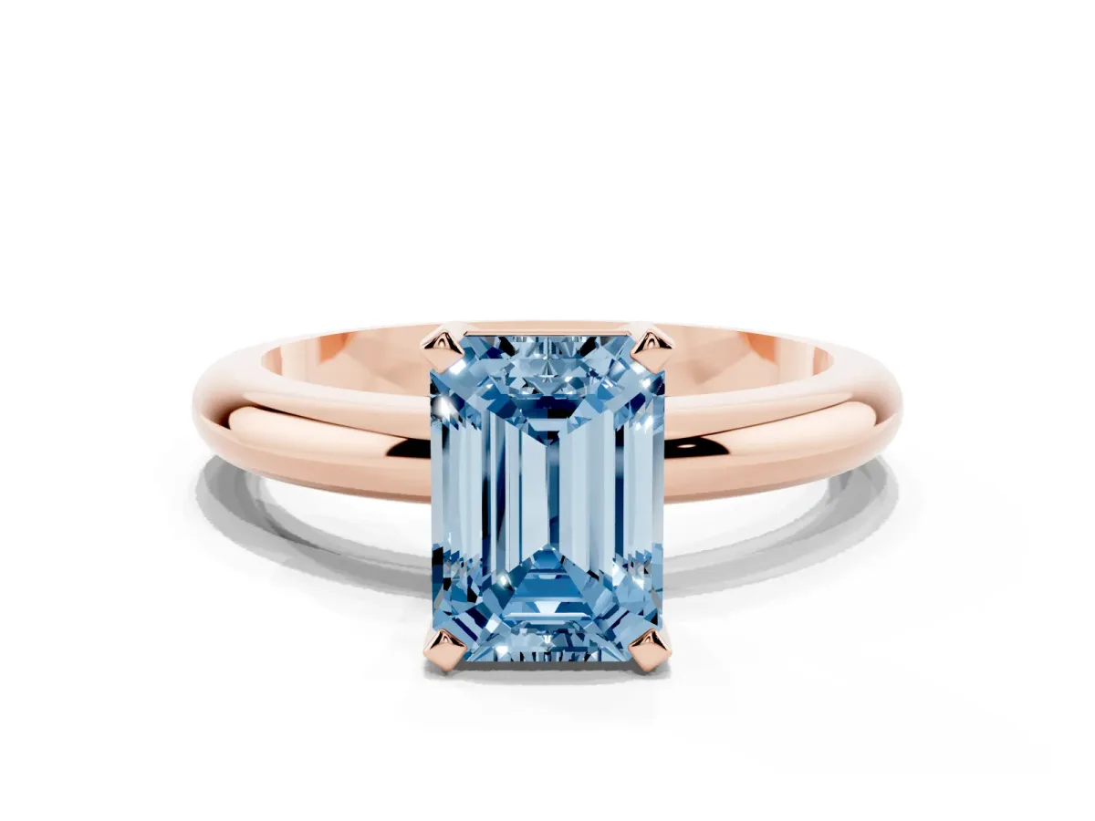 Fancy Blue Emerald Cut Diamond Solitaire Engagement Ring with Round Band and Four-Prong Setting Rose gold