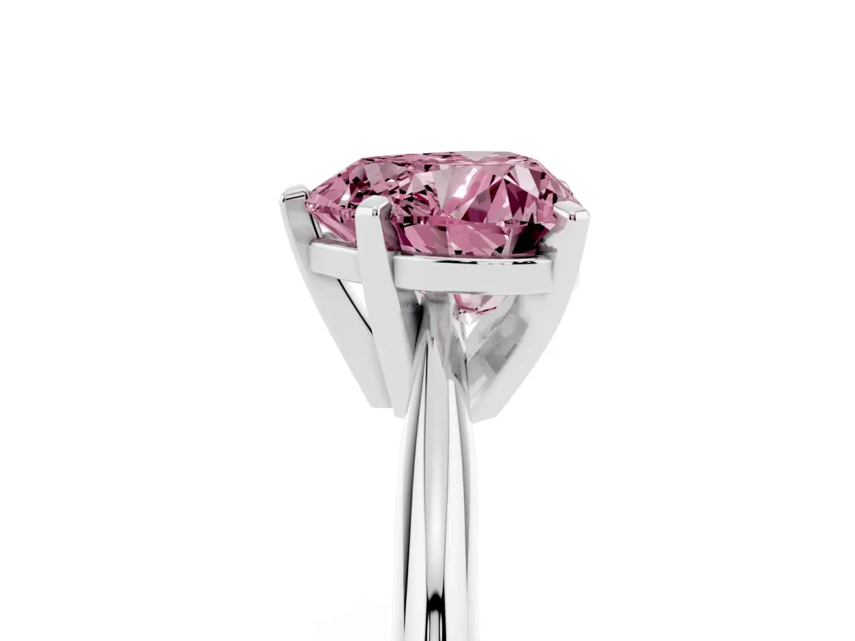 Fancy Pink Heart Cut Cut Solitaire Ring with Four-Prong Setting on a Classic Band Silver