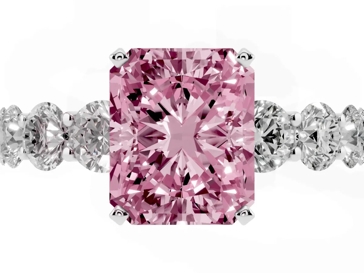 Fancy Pink Radiant Cut Diamond Prong Setting with Side Stones on a Pave Band Silver