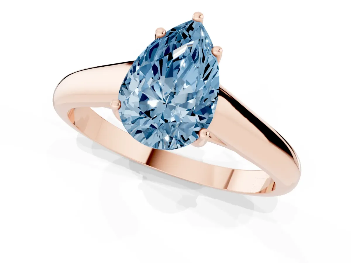 Fancy Blue Pear Cut Solitaire Engagement Ring with Tapered Band and Four-Prong Setting Rose gold
