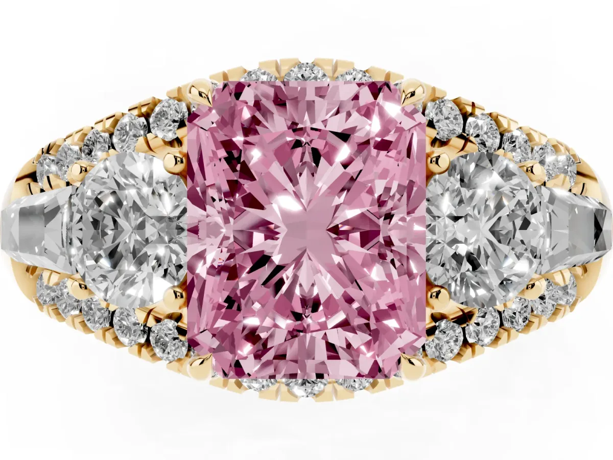 Fancy Pink Three-Stone Radiant Cut Diamond Engagement Ring with Pave Band and Prong Setting Yellow gold