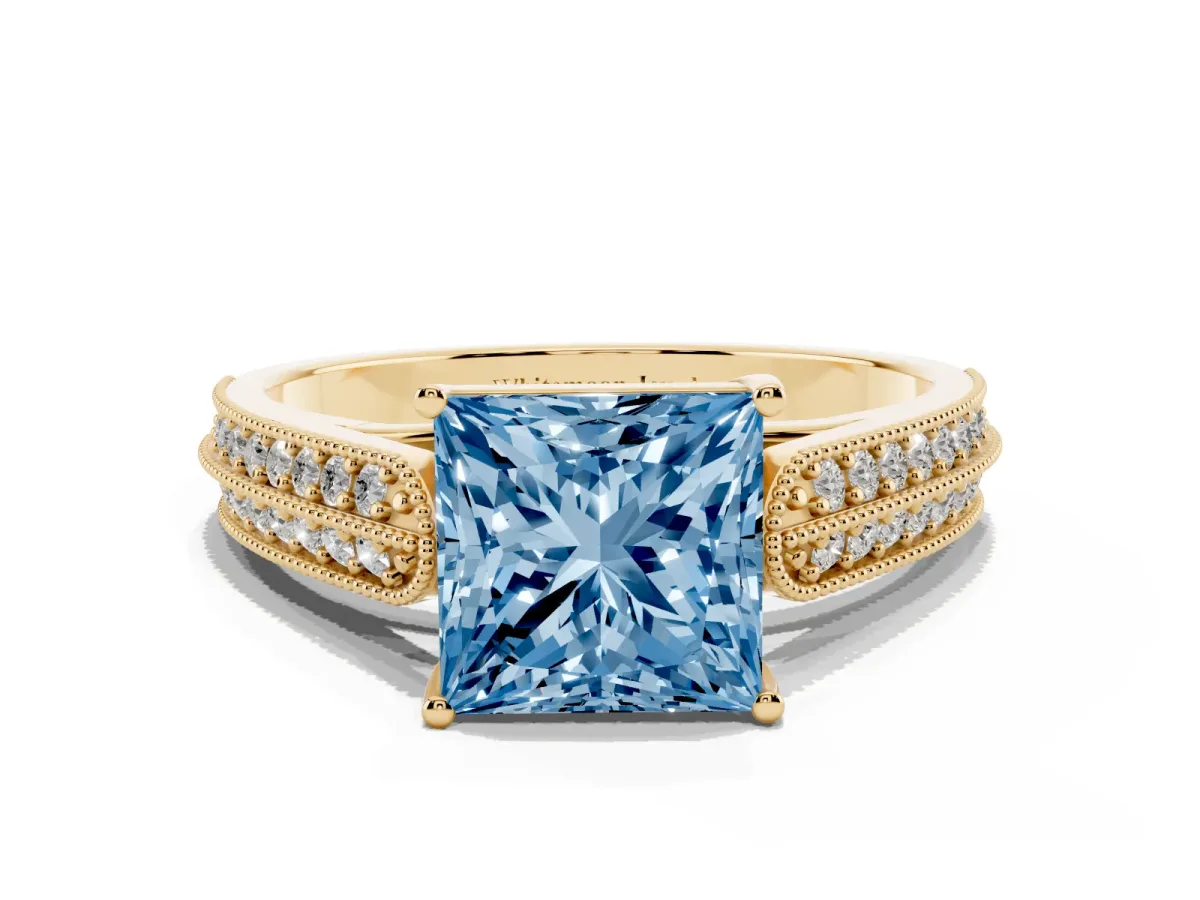 Fancy Blue Princess Cut Cut Pave Split Shank Engagement Ring with Four-Prong Setting Yellow gold