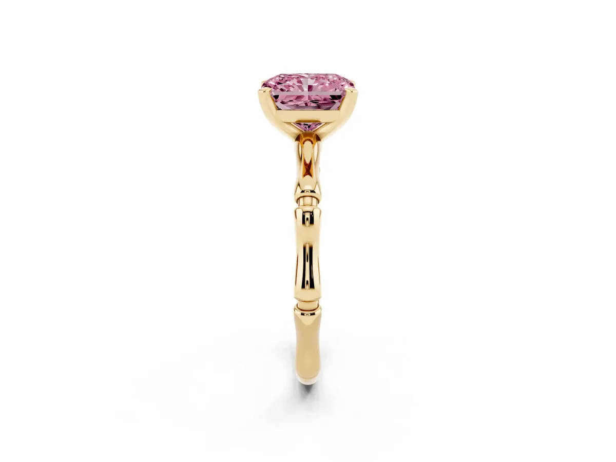 Fancy Pink Radiant Cut Solitaire Diamond Ring with Bamboo Band and Four-Prong Setting Yellow gold