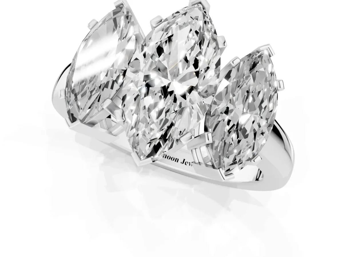 Three-Stone Marquise Cut Cut Diamond Ring with Channel Set Band and Four-Prong Setting Silver