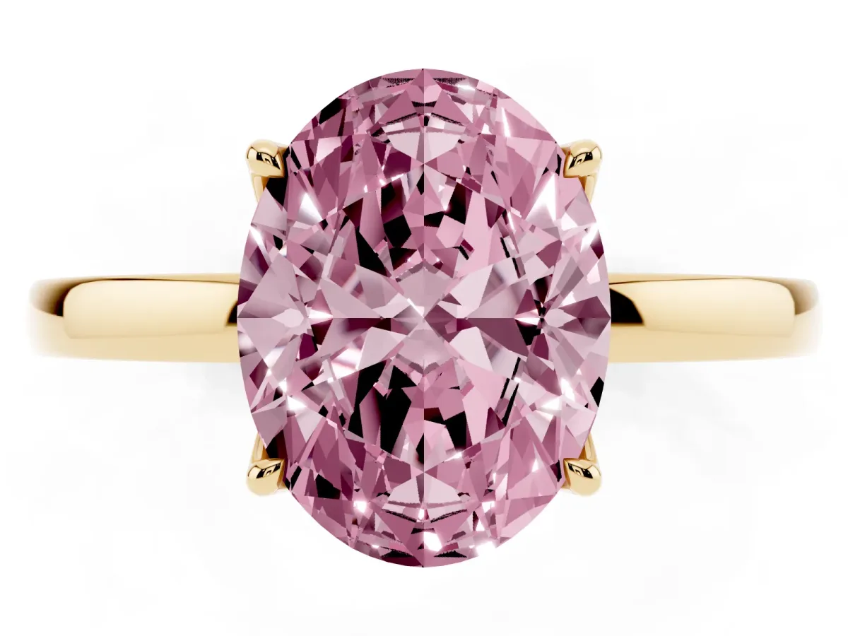 Fancy Pink Oval Cut Diamond Solitaire Ring with Thin Band and Prong Setting Yellow gold