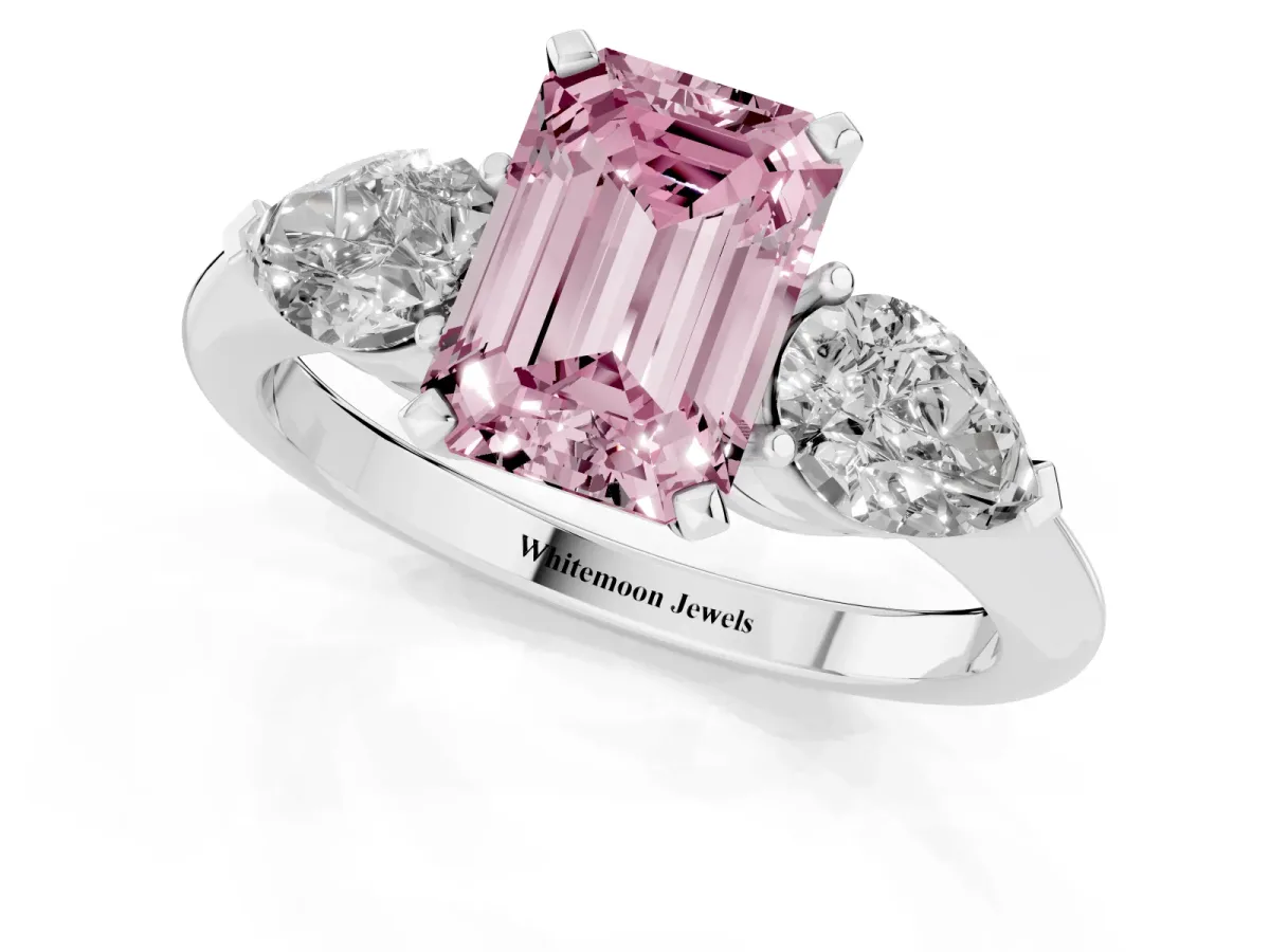 Fancy Pink Three-Stone Emerald Cut Diamond Ring with Pear Side Stones and Four-Prong Setting Silver