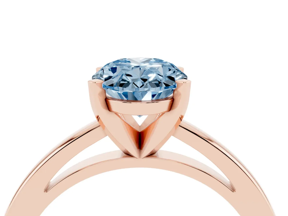 Fancy Blue Oval Cut Solitaire Diamond Engagement Ring with Four-Prong Setting on a Classic Band Rose gold