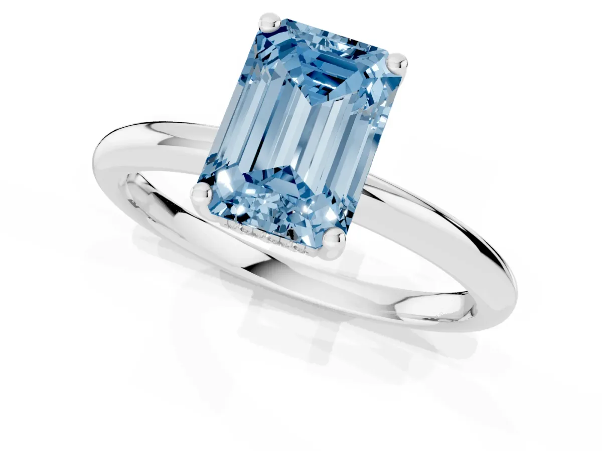 Fancy Blue Emerald Cut Cut Solitaire Engagement Ring with Four-Prong Setting and Classic Band Silver
