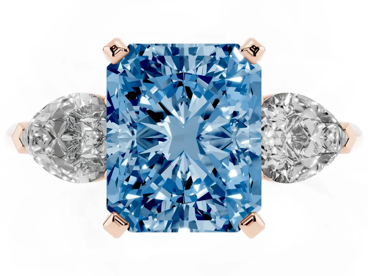 Fancy Blue Three-Stone Radiant Cut Diamond Ring with Pear Side Stones and Four-Prong Setting Rose gold