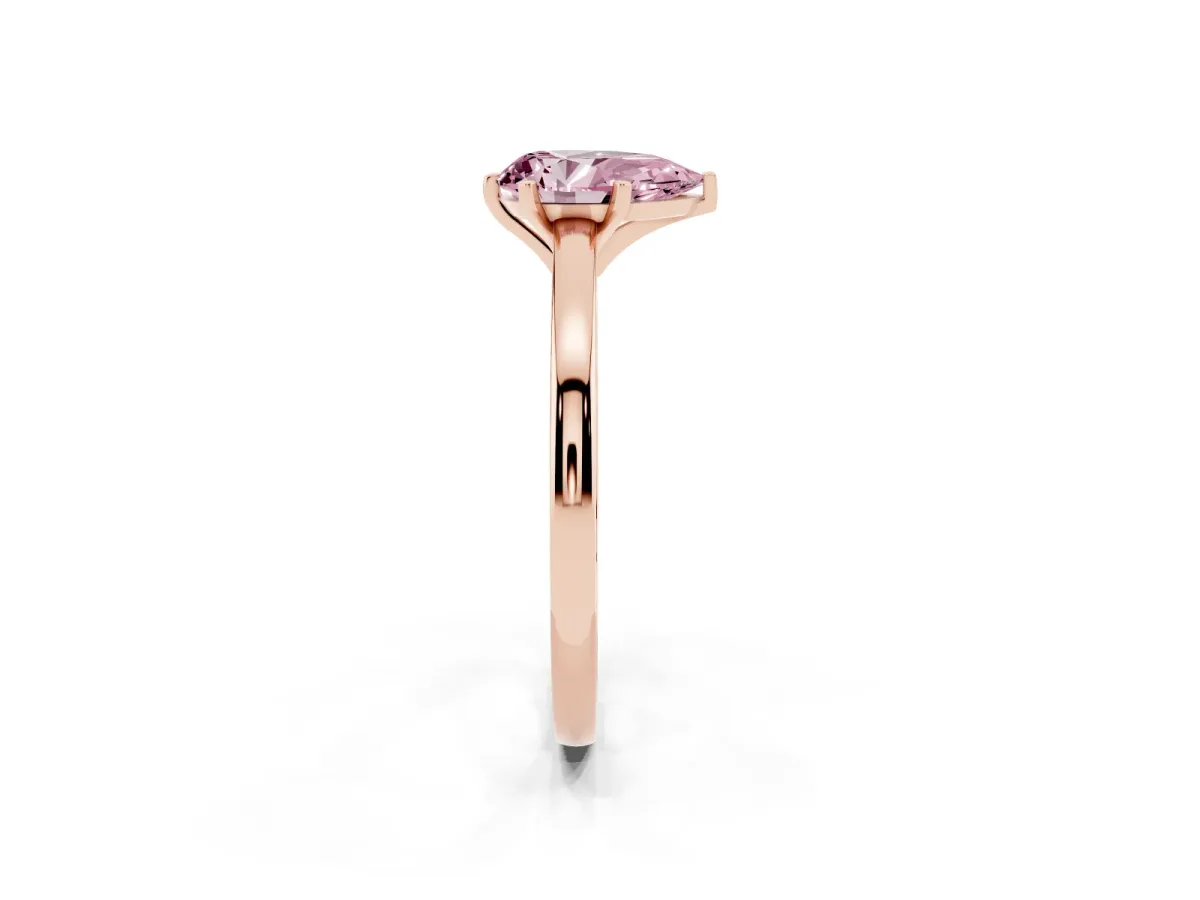 Fancy Pink Pear Cut Solitaire Diamond Engagement Ring with Four-Prong Setting on a Classic Band Rose gold