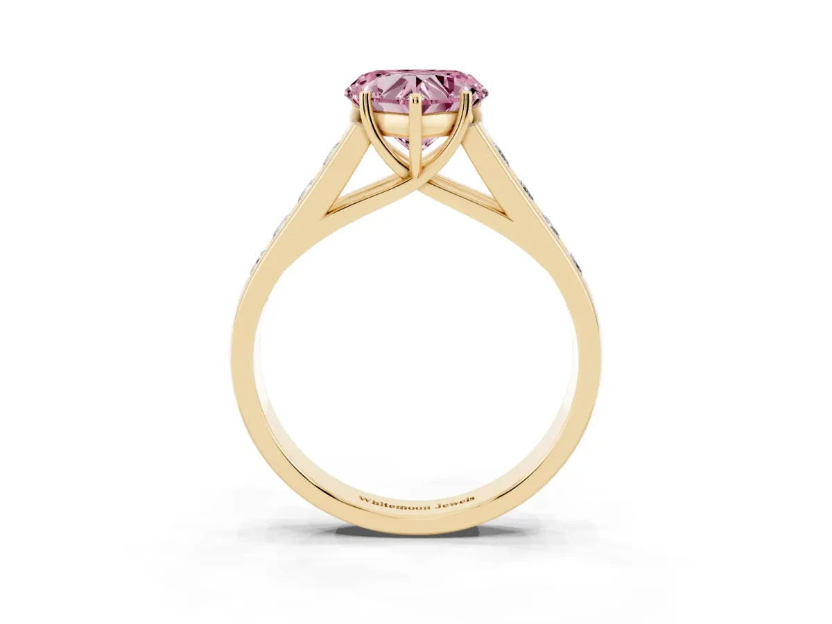 Fancy Pink Heart Cut Brilliant Channel-Set Solitaire Ring with Four-Prong Setting Yellow gold