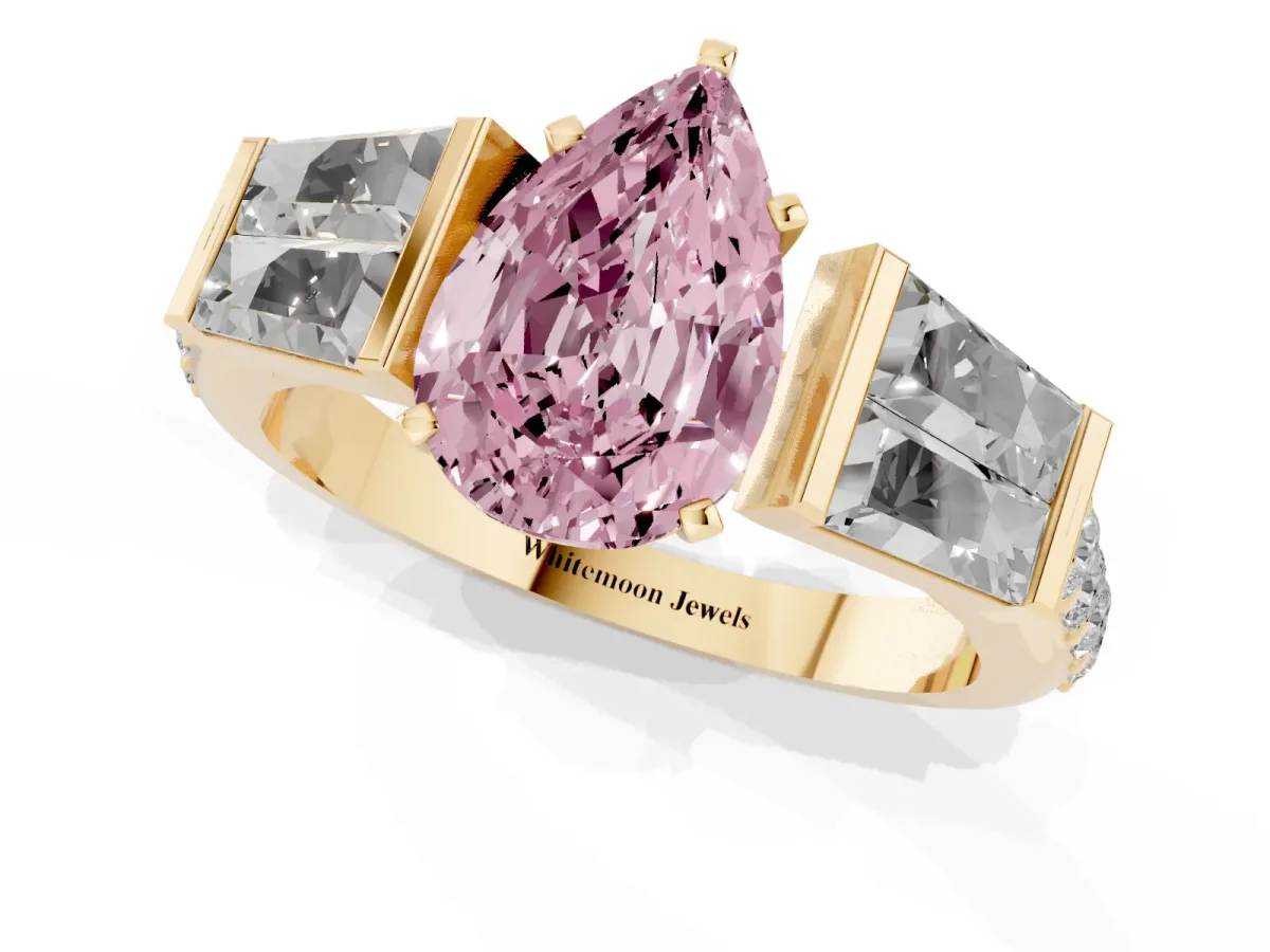 Fancy Pink Pear Cut Diamond Engagement Ring with Baguette Side Stones and Channel Set Band Yellow gold