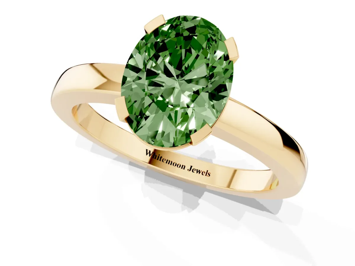 Fancy Green Oval Cut Cut Solitaire Ring with Four-Prong Setting and Classic Band Yellow gold