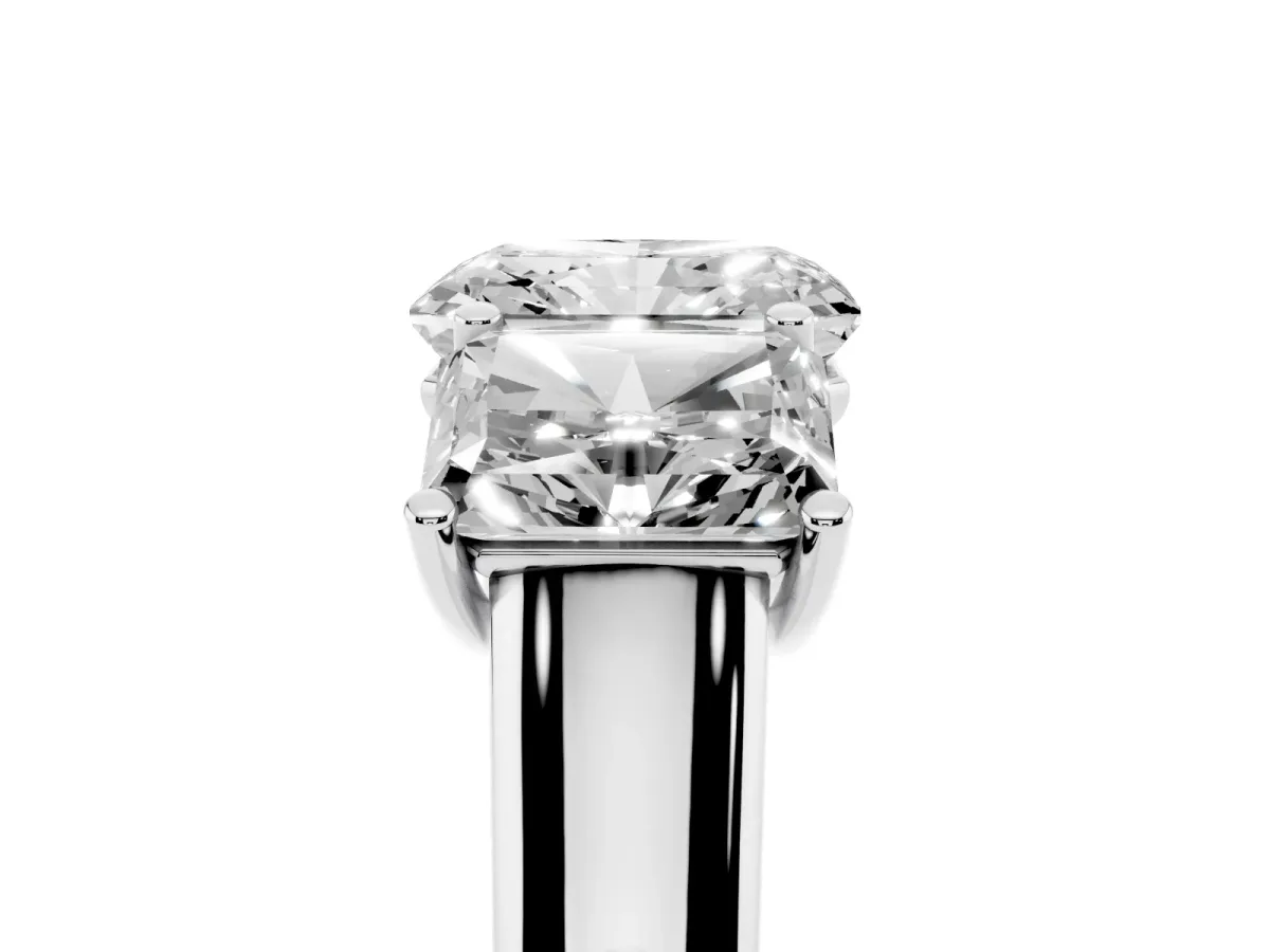 Radiant Cut Three-Stone Diamond Ring with Prong Setting on a Classic Band Silver