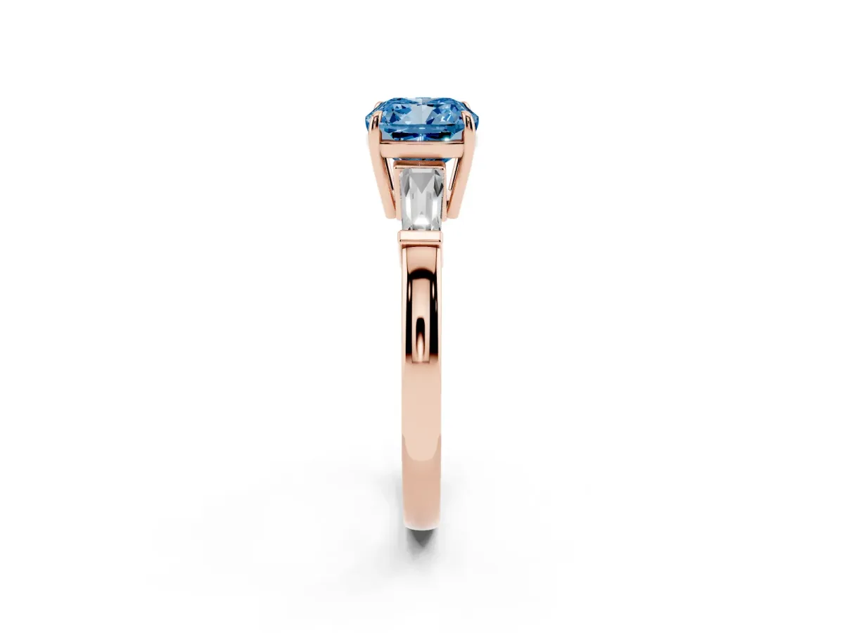 Fancy Blue Cushion Cut Diamond Three-Stone Ring with Tapered Baguette Side Stones and Prong Setting Rose gold