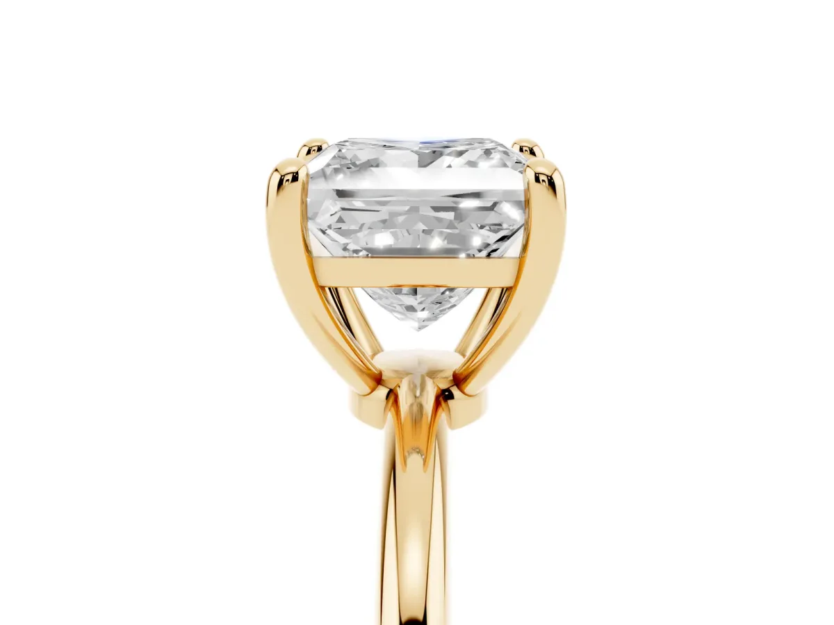 Princess Cut Solitaire Diamond Ring with 4-Prong Setting on a Classic Band Yellow gold