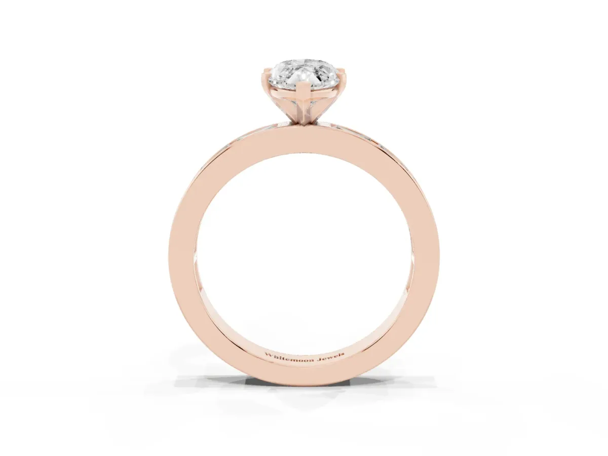 Marquise Cut Solitaire Diamond Ring with Channel-Set Baguette Band and Four-Prong Setting Rose gold