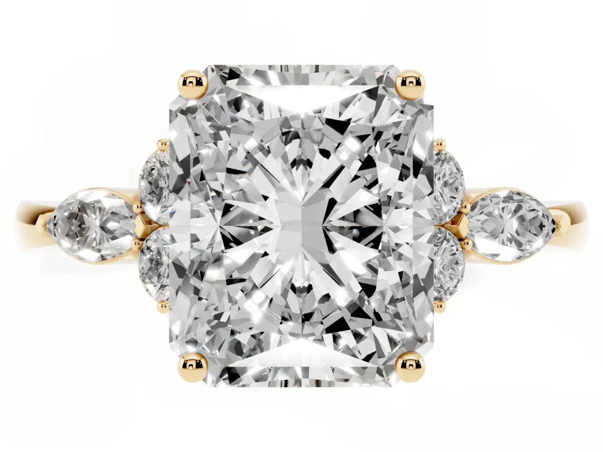 Radiant Cut Brilliant Diamond Solitaire Ring with Pear Side Stones and Four-Prong Setting Yellow gold
