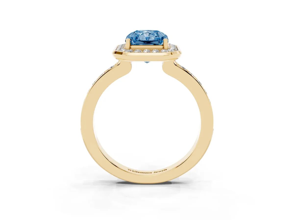 Fancy Blue Radiant Cut Diamond Halo Ring with Bezel Frame and Pavé Band Yellow gold