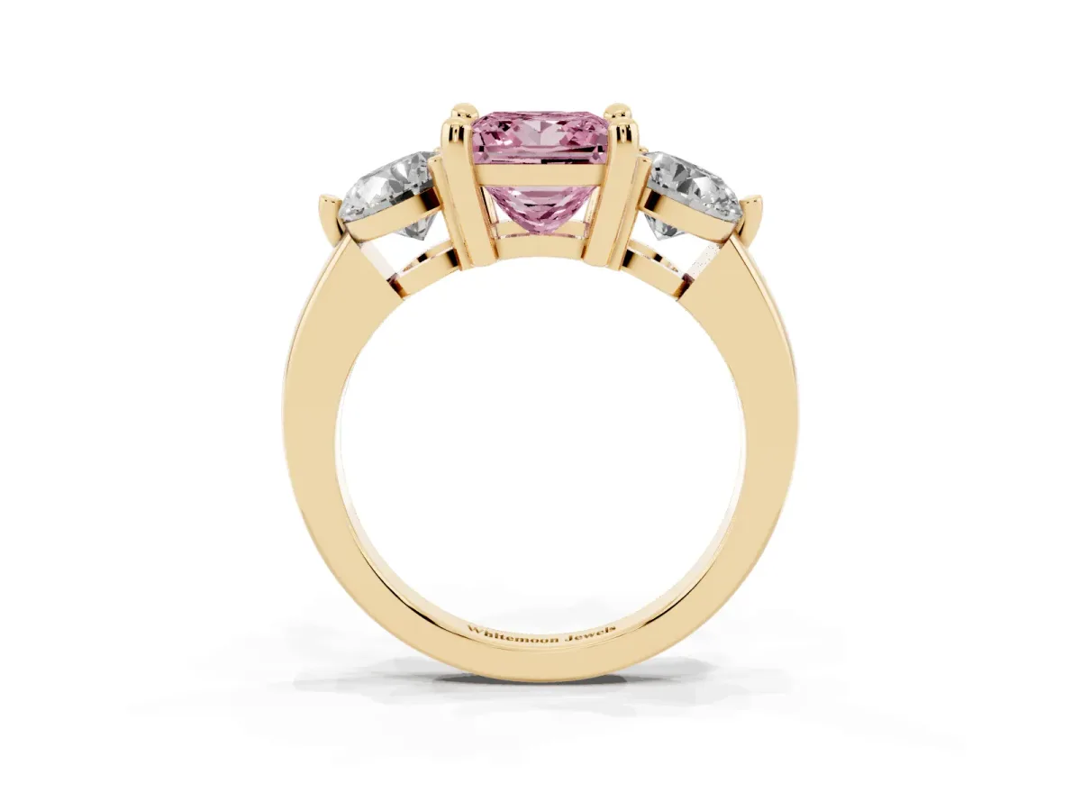 Fancy Pink Three-Stone Princess Cut Brilliant Cut Solitaire Ring with Prong Setting on a Classic Band Yellow gold