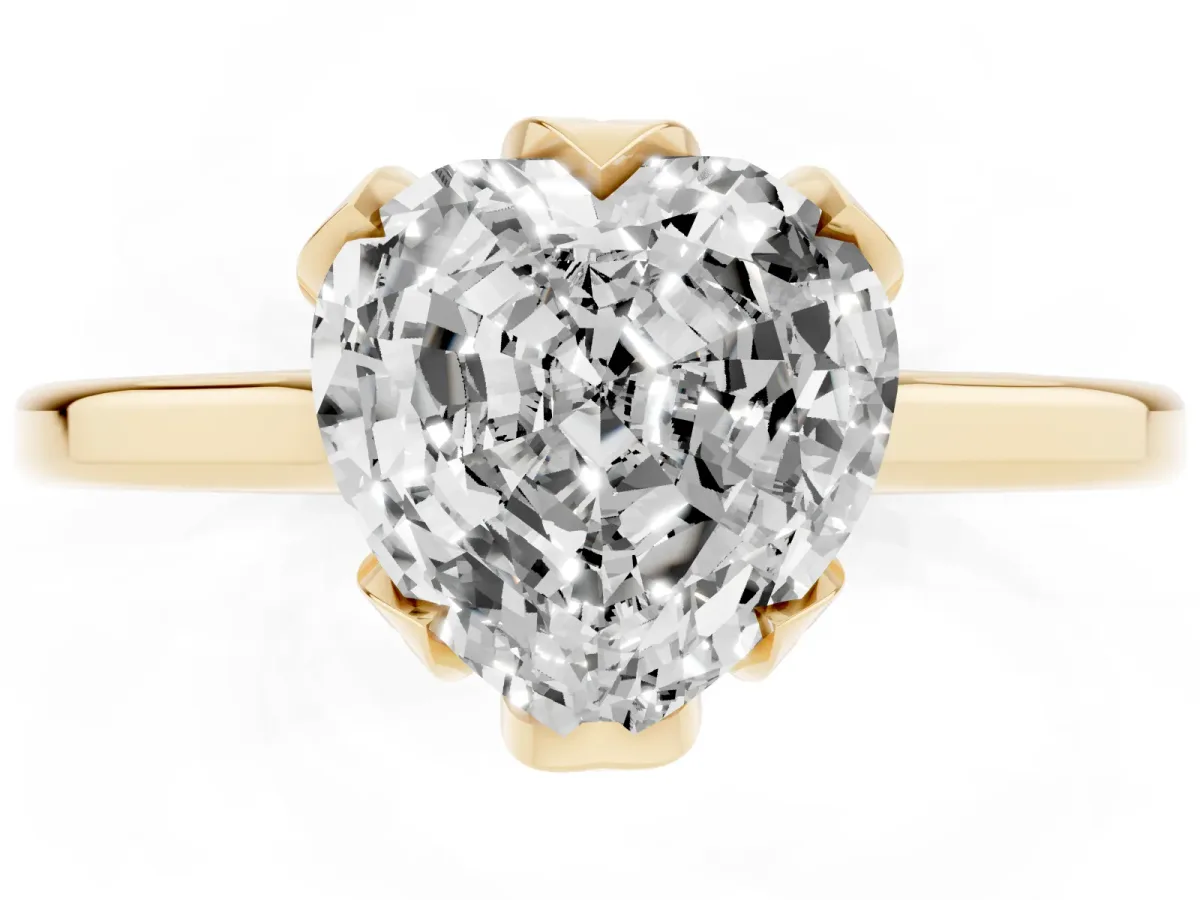Heart Cut Diamond Solitaire Ring with Flower Prong Setting and Classic Band Yellow gold