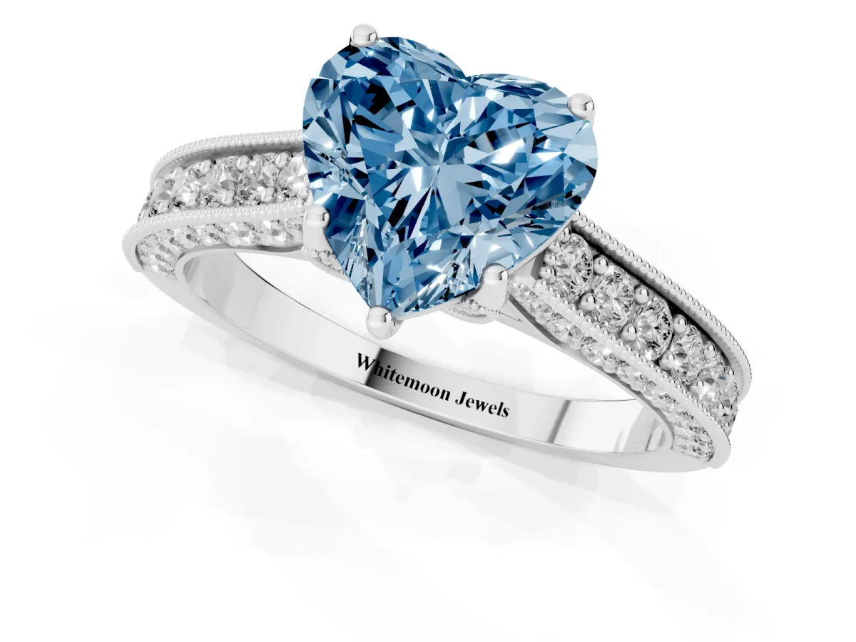 Fancy Blue Heart Cut Cut Diamond Solitaire Ring with Milgrain Pave Band and Four Prong Setting Platinum