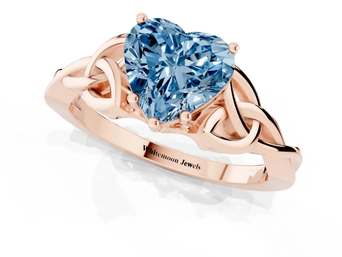 Fancy Blue Heart Cut Diamond Solitaire Engagement Ring with Celtic Knot Band and Four-Prong Setting Rose gold