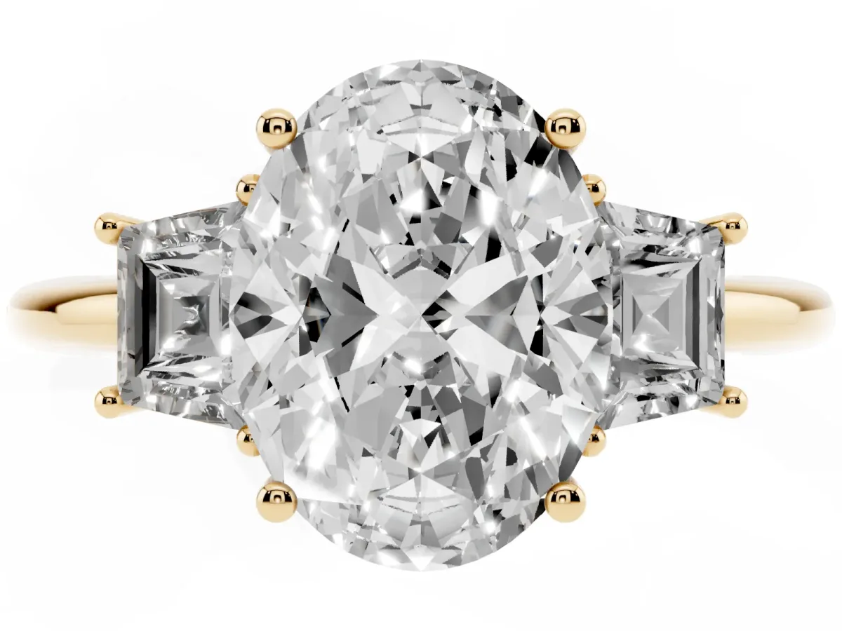 Oval Cut Diamond Three-Stone Ring with Trapezoid Side Stones and Prong Setting Yellow gold