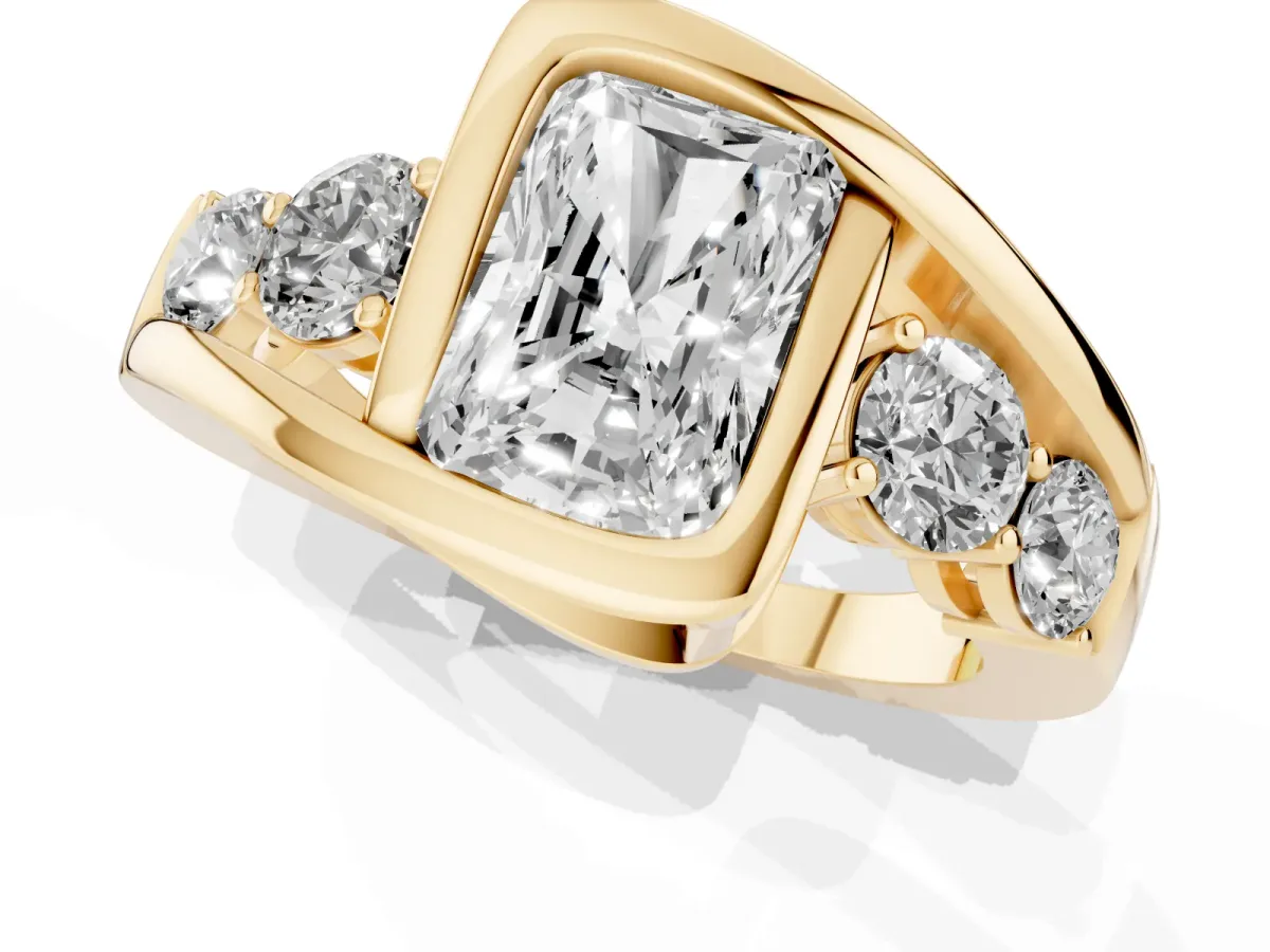 Bezel Set Radiant Cut Diamond Bypass Ring with Round Accents Yellow gold