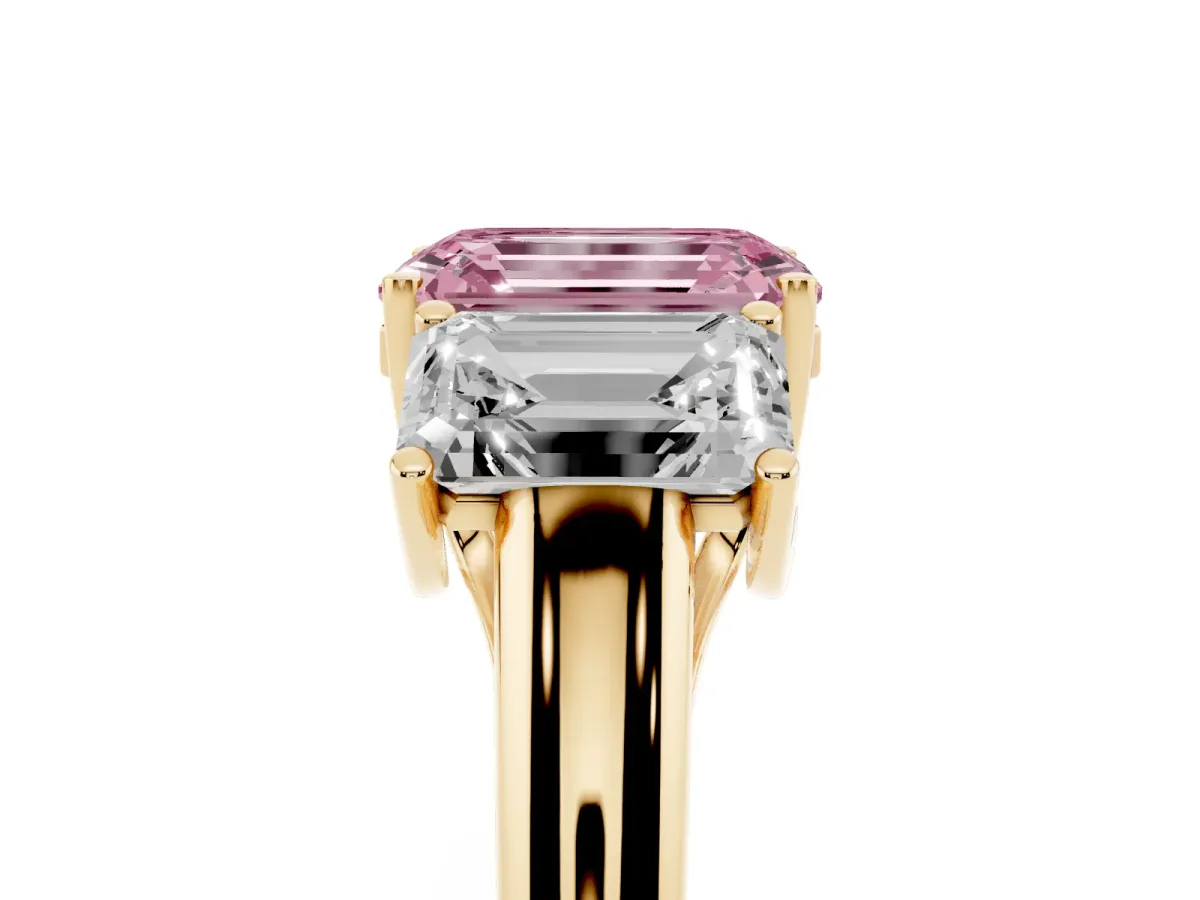 Fancy Pink Three-Stone Emerald Cut Diamond Engagement Ring with Prong Setting Yellow gold
