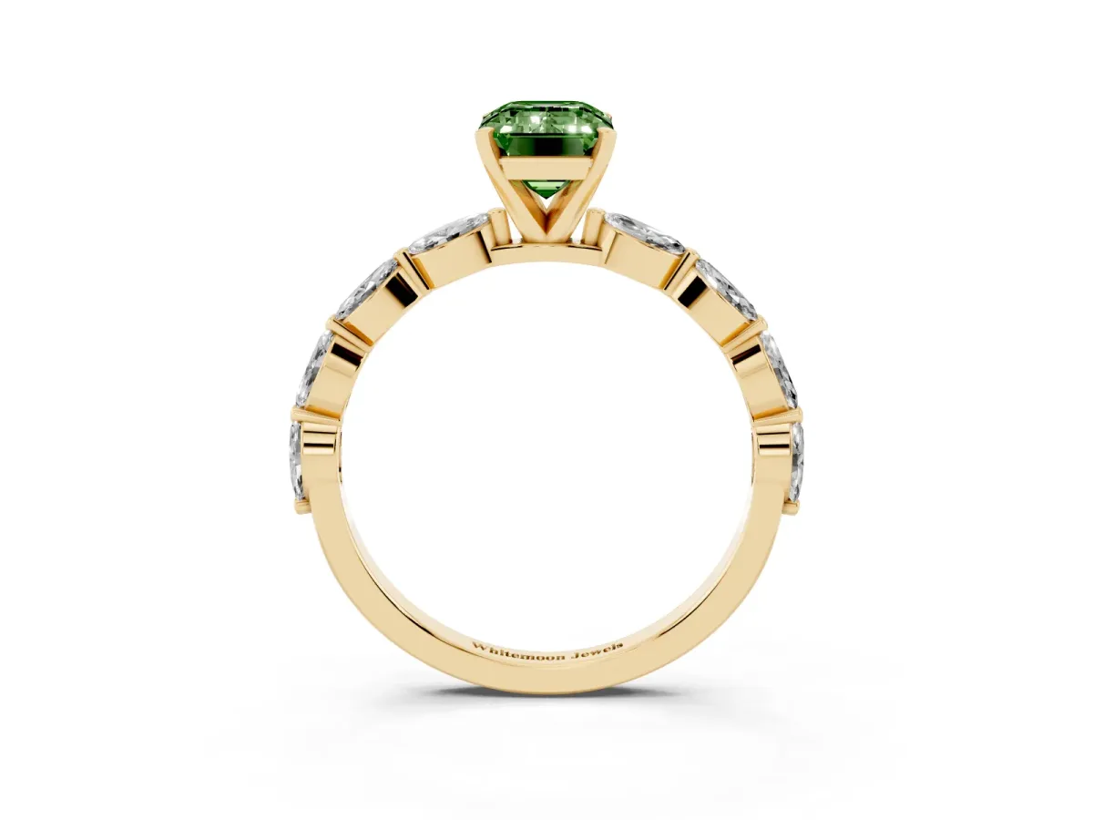 Fancy Green Emerald Cut Diamond Ring with Marquise Side Stones and Prong Setting Yellow gold