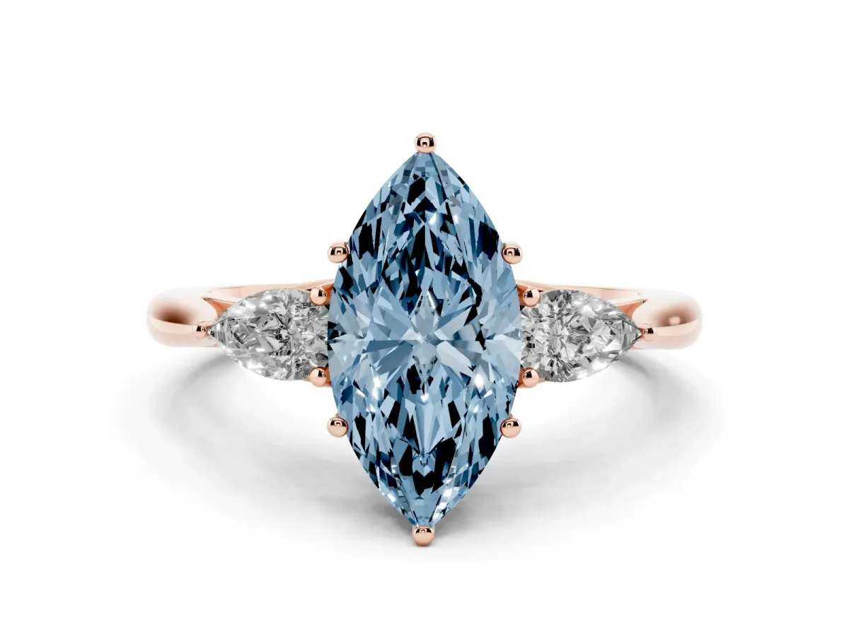 Fancy Blue Three-Stone Marquise Cut Diamond Ring with Pear Side Stones in Four-Prong Setting Rose gold