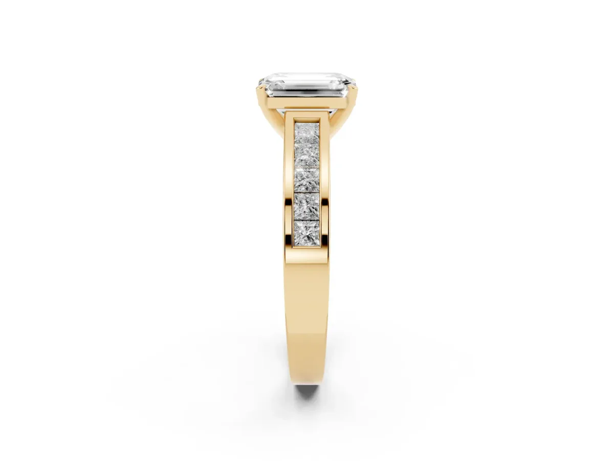 Emerald Cut Solitaire Diamond Ring with Channel-Set Band and Four-Prong Setting Yellow gold