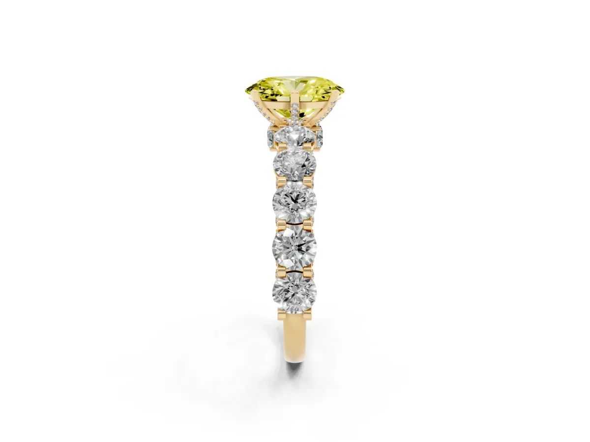 Fancy Yellow Oval Cut Diamond Side Stone Engagement Ring with Four-Prong Setting Yellow gold