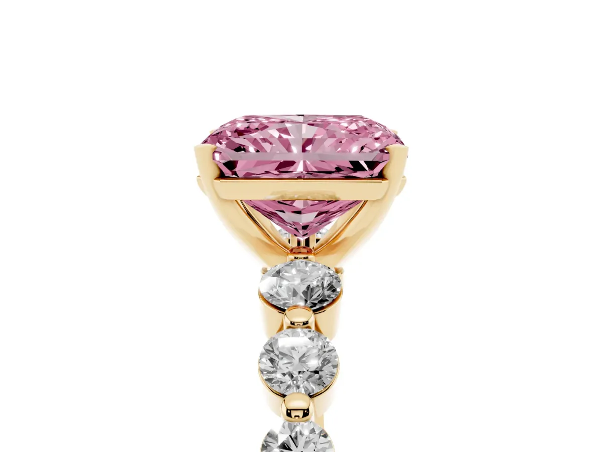 Fancy Pink Radiant Cut Solitaire Diamond Ring with Pave Band and Four-Prong Setting Yellow gold