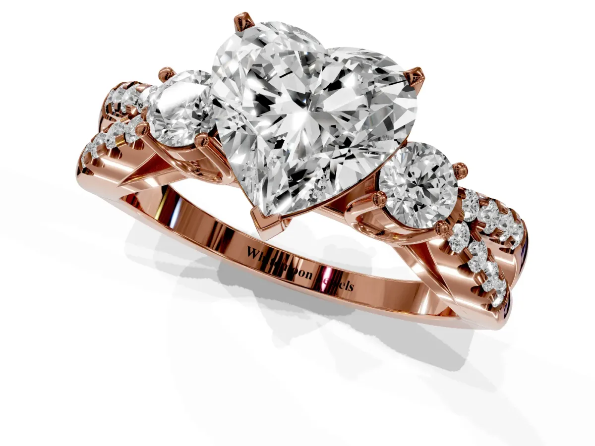 Heart Cut Diamond Three-Stone Ring with Pavé Split Shank and Four-Prong Setting Rose gold