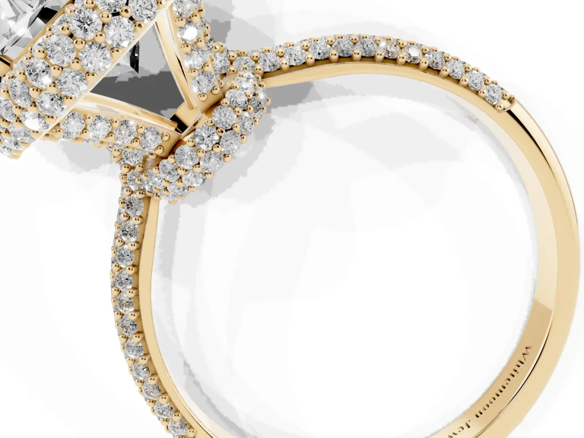 Oval Diamond Halo Ring with Round Diamond Accents Yellow gold