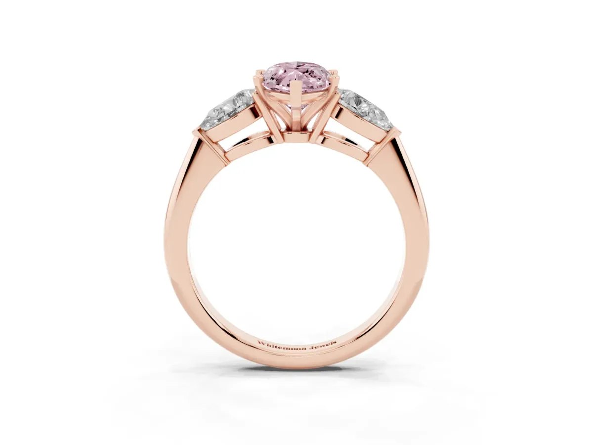 Fancy Pink Three-Stone Marquise Cut Diamond Ring with Pear Side Stones and Four-Prong Setting Rose gold