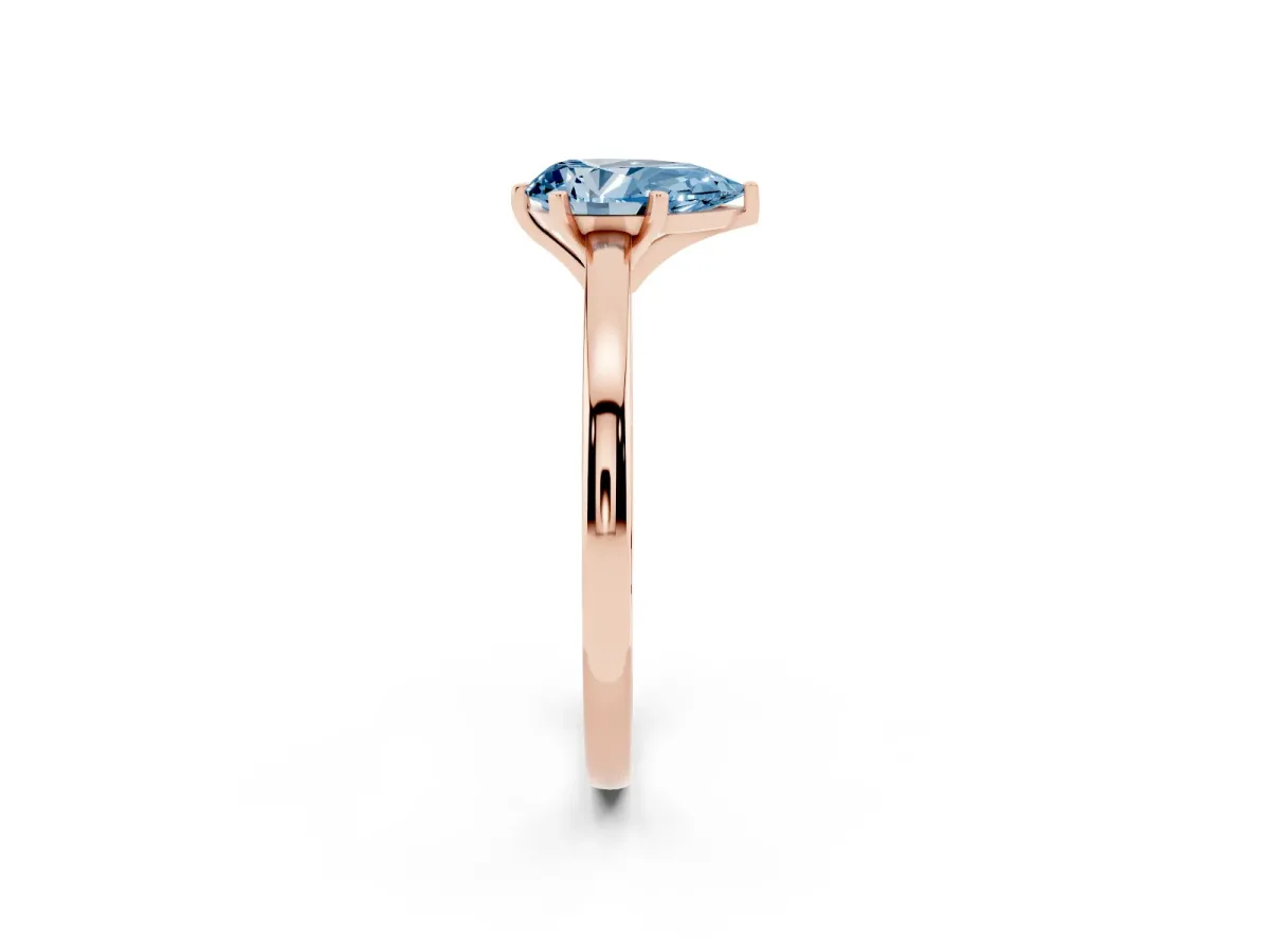 Fancy Blue Pear Cut Solitaire Diamond Engagement Ring with Four-Prong Setting on a Classic Band Rose gold