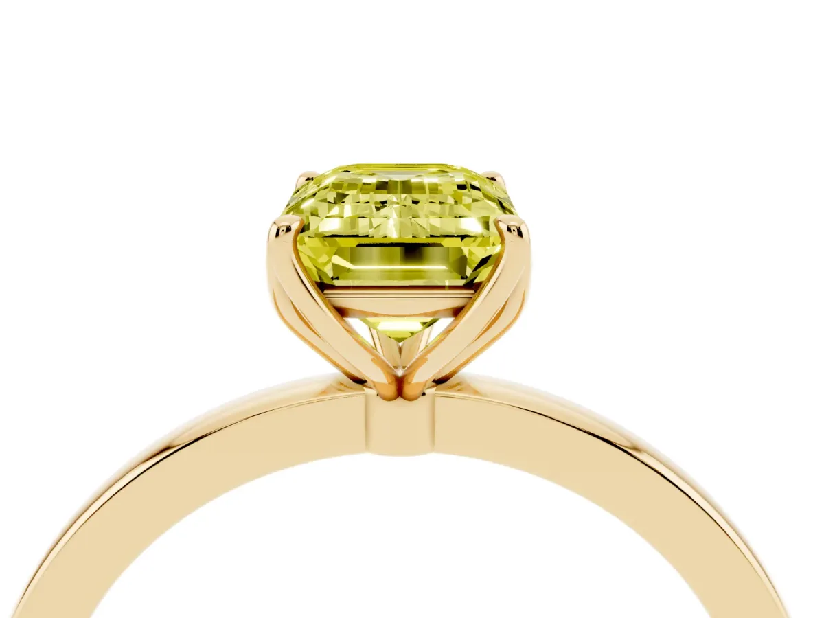 Fancy Yellow Emerald Cut Diamond Solitaire Ring with Thin Band and Prong Setting Yellow gold